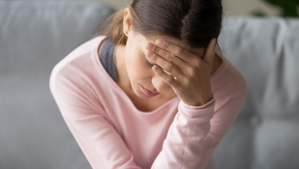 Woman closing eyes